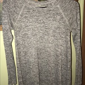 long sleeve, high low flows shirt.